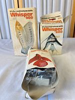 Front view of three Whisper pump boxes models 900, 600, 200