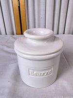 Front view of butter bell showing "Beurre" embossing