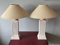 pair of ceramic column lamps with shades