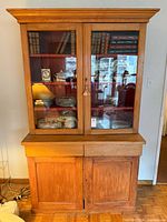 Full view of cabinet showing overall design and two-piece structure