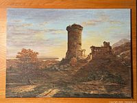 Full view of unframed oil on canvas panel showing castle ruin landscape