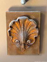 Front view of plaster wall plaque