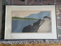 Full view of framed etching showing artwork, frame, mat and water stain