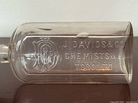Front panel showing embossed J. Davids & Co. Chemists &c Toronto lettering
