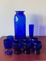 Group shot of all cobalt blue glass pieces