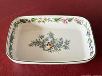 Top view showing interior herb pattern and green rim