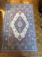 Full view of kilim rug showing overall pattern and colors