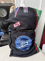 Rolled fleece blanket showing Toronto Argonauts logo