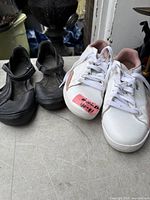 Top view of both shoe pairs on table