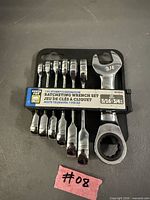 Front of Power Fist 7-piece stubby ratcheting wrench set showing sizes and packaging