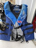Front view of Fluid life jacket showing color, straps, and buckles