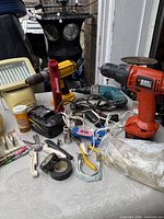 Overview of drills, flashlight, work light, charger, wiring, small tools