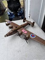 Left front view of metal B-24 model showing overall form and RAF roundels