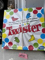Front of Twister game box showing branding and age range