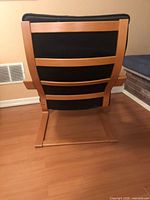 Rear view showing bentwood frame slats and base