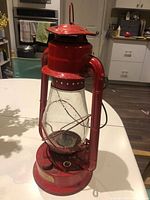 Lantern front angled view showing body, globe, wear