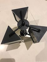 Overhead view of triangular rotating photo frame