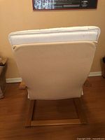 Rear view displaying back cushion and frame