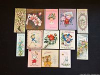 Group shot of all 13 vintage greeting cards laid out