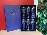 Opened presentation box showing six goblets seated