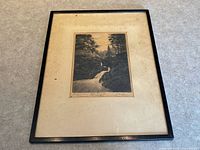 Full view of framed etching showing frame, mat and image