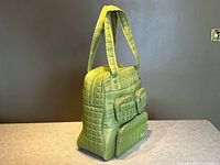 Side profile highlighting quilting and straps