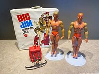 Group shot of both figures, carry-all case and rescue backpack