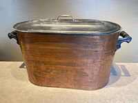 Front view of copper tub with lid attached