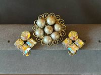 full set showing brooch and both earrings