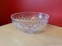 side view showing diamond-cut pattern and scalloped rim