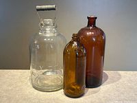 Group shot of all three bottles showing relative sizes and colors