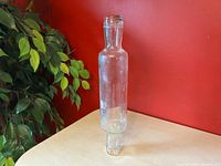 Rolling pin standing upright showing overall form