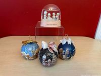 All four Precious Moments holiday items grouped
