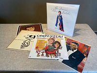 All five LP covers displayed on table