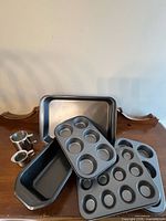 All bakeware pieces and creamers displayed