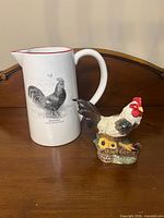 Pitcher and figurine together for scale and overview