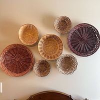 All seven baskets displayed on wall to show variety of sizes and colors