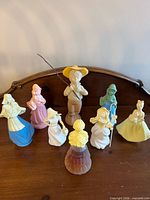 Group shot of all 8 figural bottles