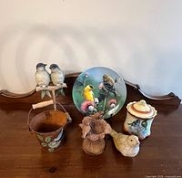 All six bird-themed items arranged together