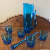 full set showing pitcher, five tumblers, stir stick