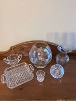 Group shot showing all six glass and crystal pieces