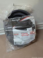 Front view of Parts2O sump pump discharge hose kit in sealed packaging