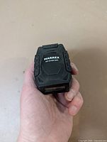 Front view of Marrex MX-G10M MKII GPS unit held in hand