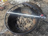 Interior view showing ash, rust and tape measure confirming diameter