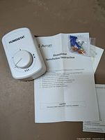 Humidistat, instruction sheet, and hardware pack displayed