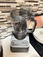 Front view of complete Ninja food processor on countertop