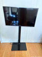 Front view of Samsung TV on stand