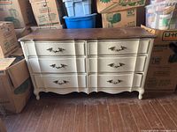 Full view of dresser front showing six drawers, painted body and stained top