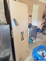 Full view of boxed IKEA countertop with logo visible, shows overall condition