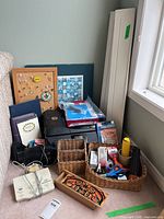 Overall lot showing printer, baskets, stationery, shelves and board